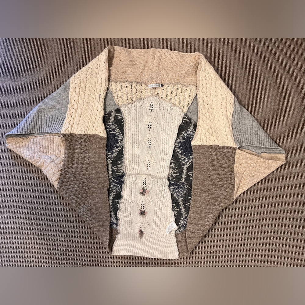 Cozy batwing wool sweater by Preloved for Holt Renfrew. 100% wool